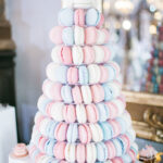 Tired dish served with pink, white and blue macaroons Tired dish served with pink, white and blue macaroons